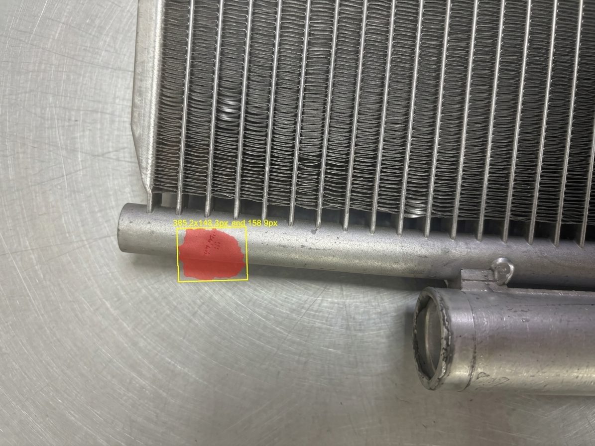 Condenser surface with a defect region segmented and measured in pixels.